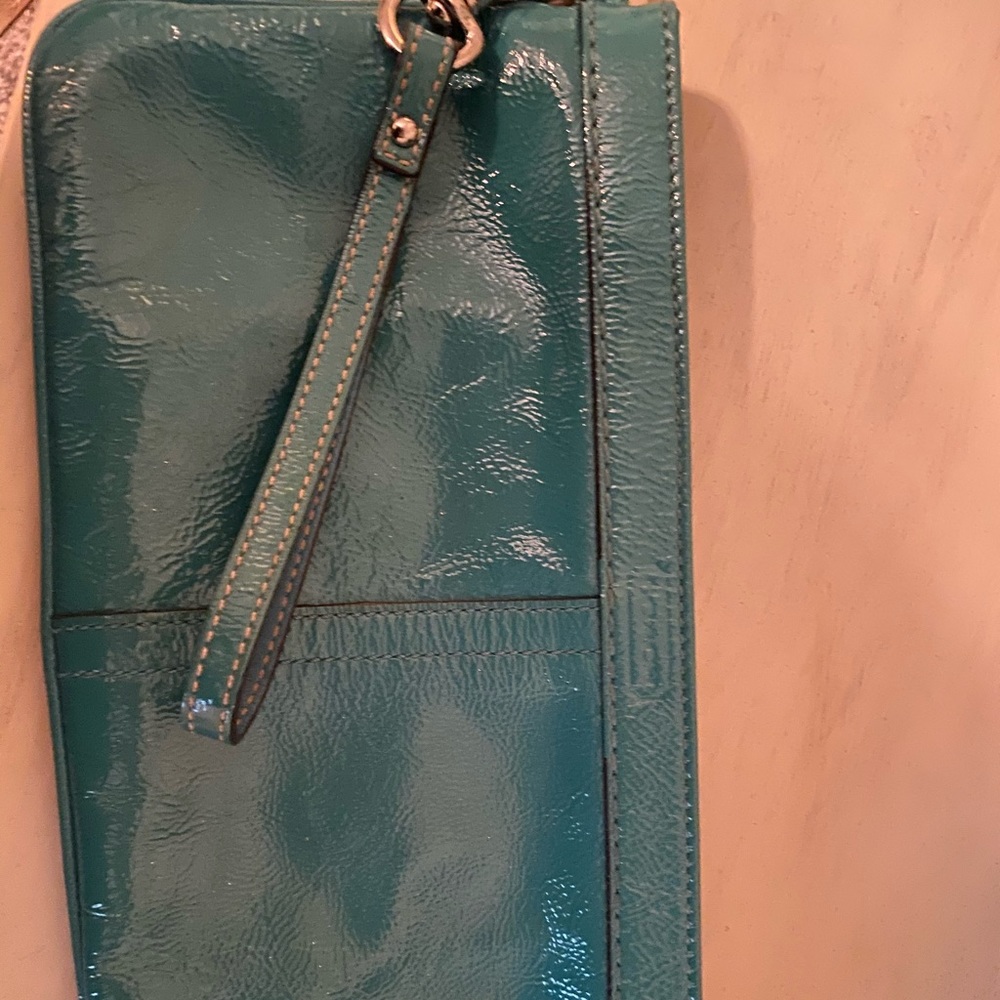 COACH teal wristlet clutch